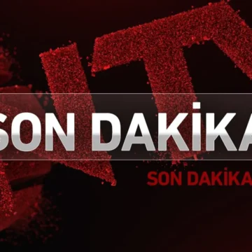 Karabağlar'daki şubede yaşanan silahlı soygun girişimi sonrası bölgeye sevk edilen ekipler. İzmir Karabağlar'da bir banka şubesinin önünde güvenlik önlemi alan polis ekipleri